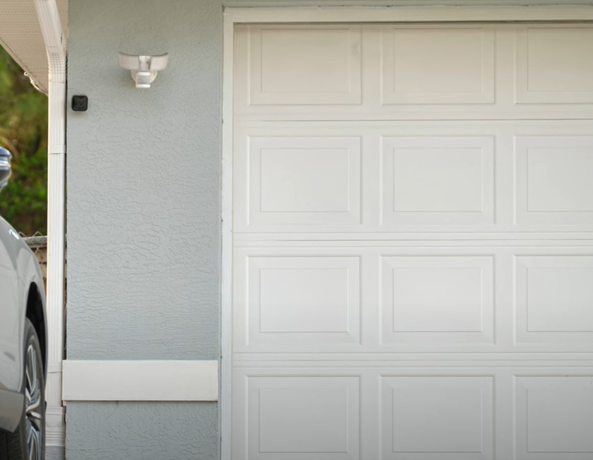 Technician performing same-day garage door repair, highlighting professional service by Mariner Garage Door Repair.