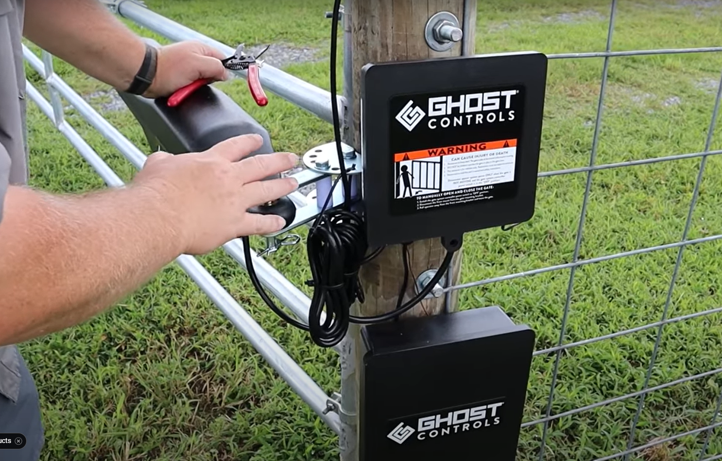 Professional technician repairing a gate mechanism at Mariner Garage Door Repair, highlighting expert gate repair services.