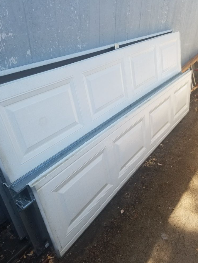 garage door panels repair service in Mariner, FL of Mariner Garage Door Repair.