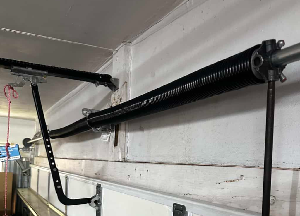 a photo of new repair garage door spring of garage door spring repair service of Mariner Garage Door Repair.